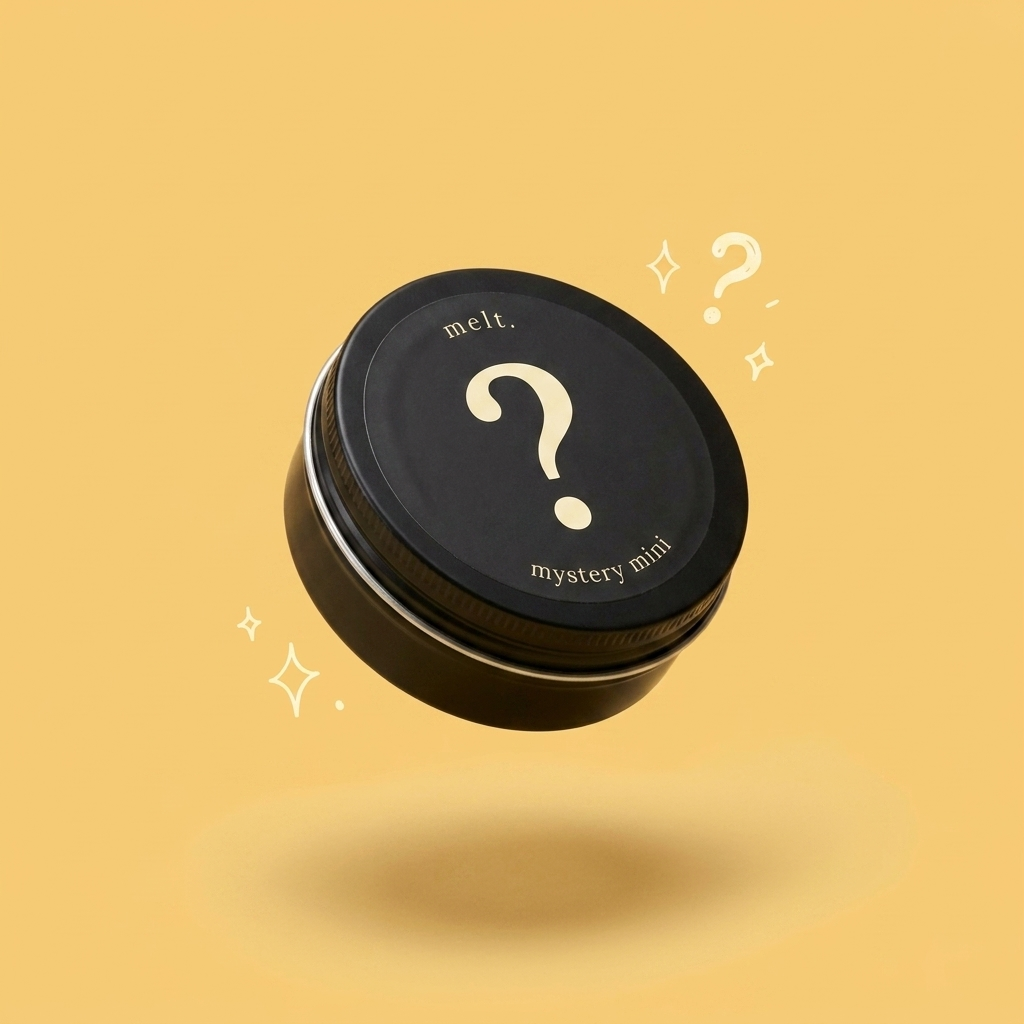 melt. mystery mini — 2oz surprise-scent candle tin with a question mark lid