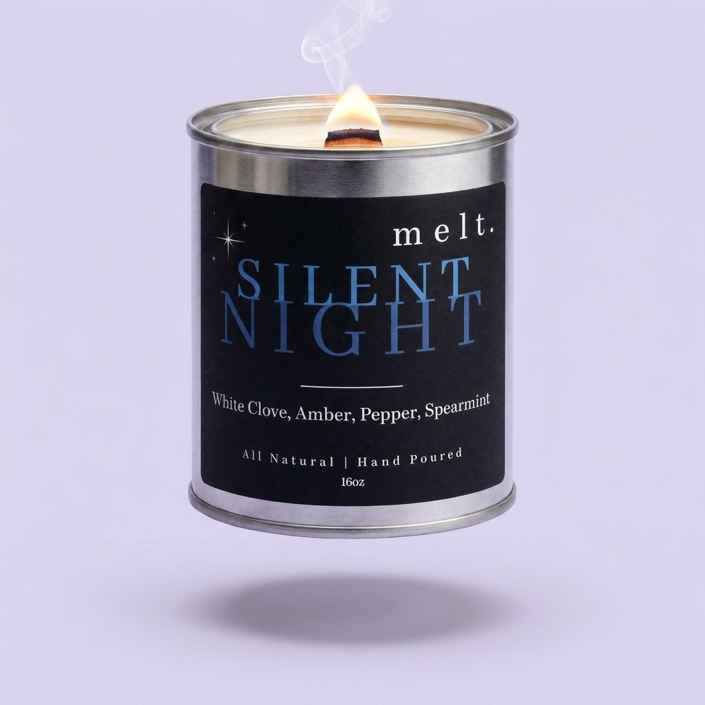 melt. silent night candle floating with lit wooden wick and a wisp of smoke on a pale lavender background