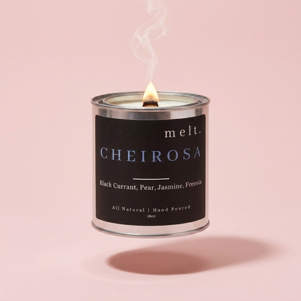 melt. cheirosa candle floating with lit wooden wick and a wisp of smoke on a pale blush pink background